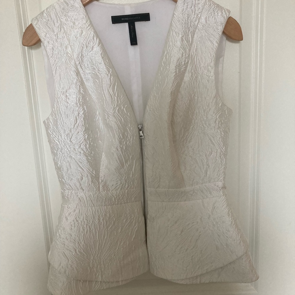 White peplum top